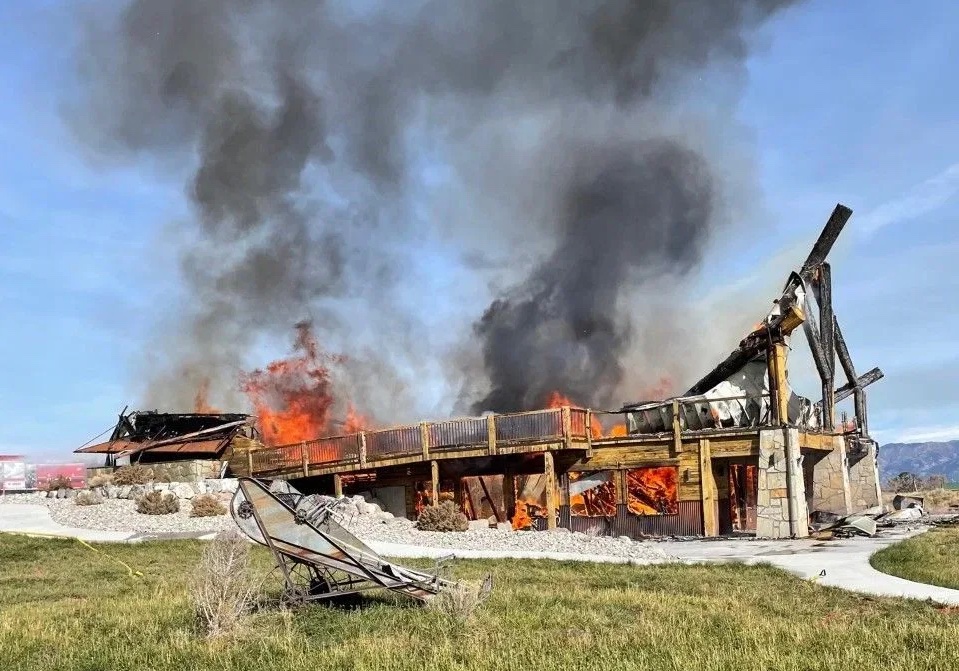 2021 fire at Royal Creek Ranches destroying Elk Ridge Lodge, a pivotal moment in the ranch’s history of resilience and rebuilding.